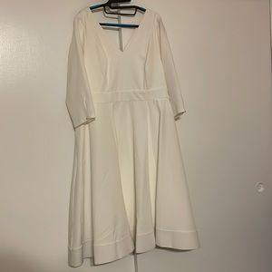 NWT Special occasion white fit and flare midi dress with weighted hem.